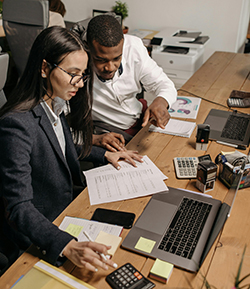 two accountants working on billing issues